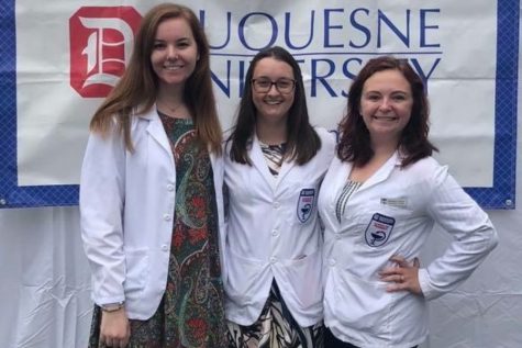 Miranda Lowery Burgman (far right) is preparing to enter the mdeical field as she studies at Duquesne.