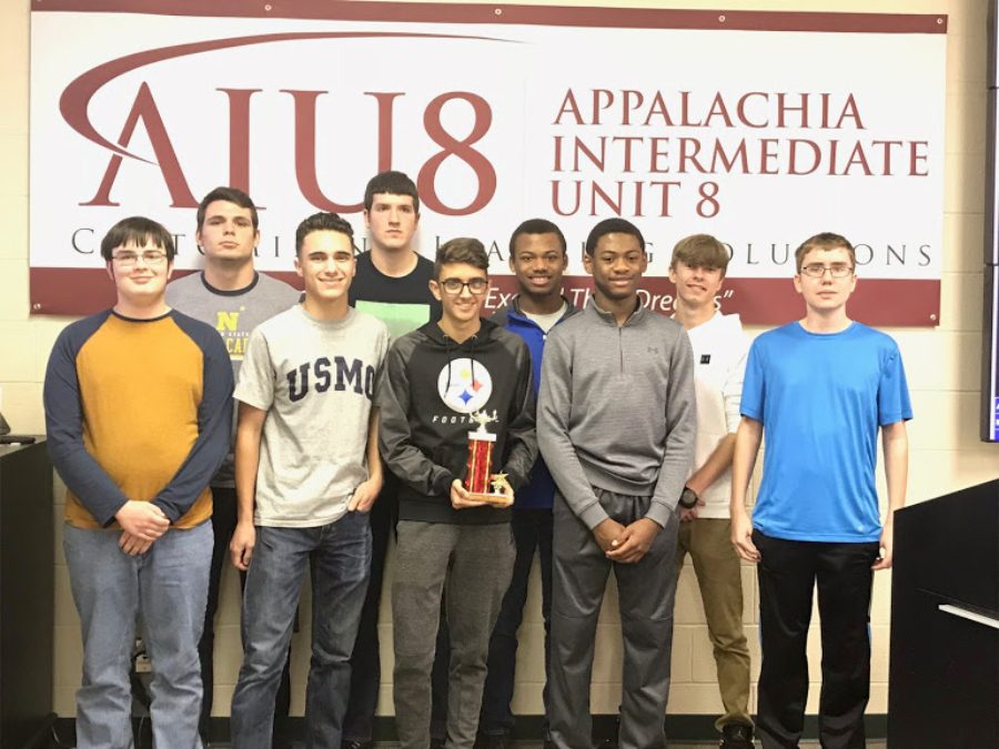 Scholastic Scrimmafge team members (l to r) Philip Chamberllin, Caden Nagle, Paulino Cuevas, Nathan Wolfe, Daniel Kustaborder, Alex Taylor, Aiden Taylor, Kenny Robinson, and John Sloey, took fourth overall at the IU8 competition.