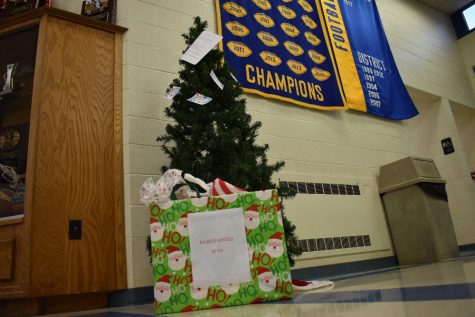 Theres still time to take a tag from one of the Blue Angels Christmas trees and spread some holiday cheer.