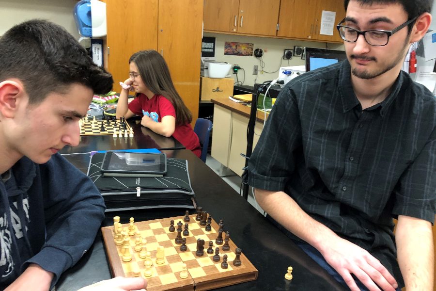 Brothers Caedon and Zion Poe square off in Chess Club.