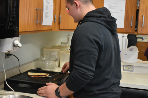 Dominic making a nice lovely omelet with his skills.