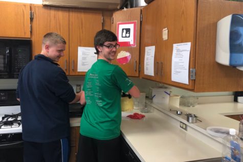 Jacob Fitzgerald, right, loves to cook pancakes and help his classmates in Home Ec.