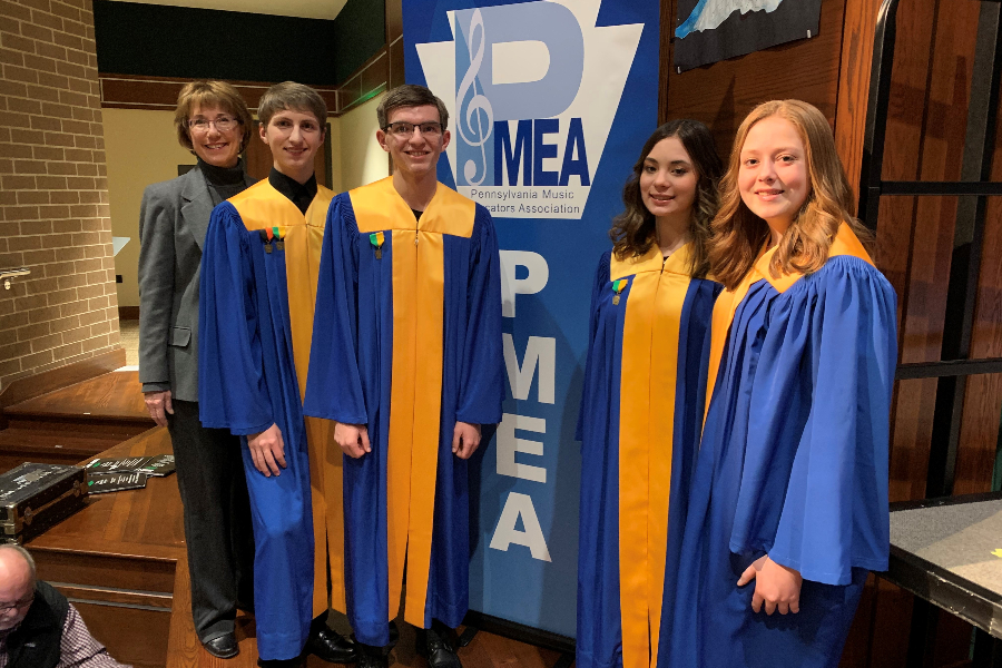 Mrs. Hull with Noah Patton, Dallas Smithmyer, Maliah Danish and Jayce Miller. All four students are attending Regional chorus this week.