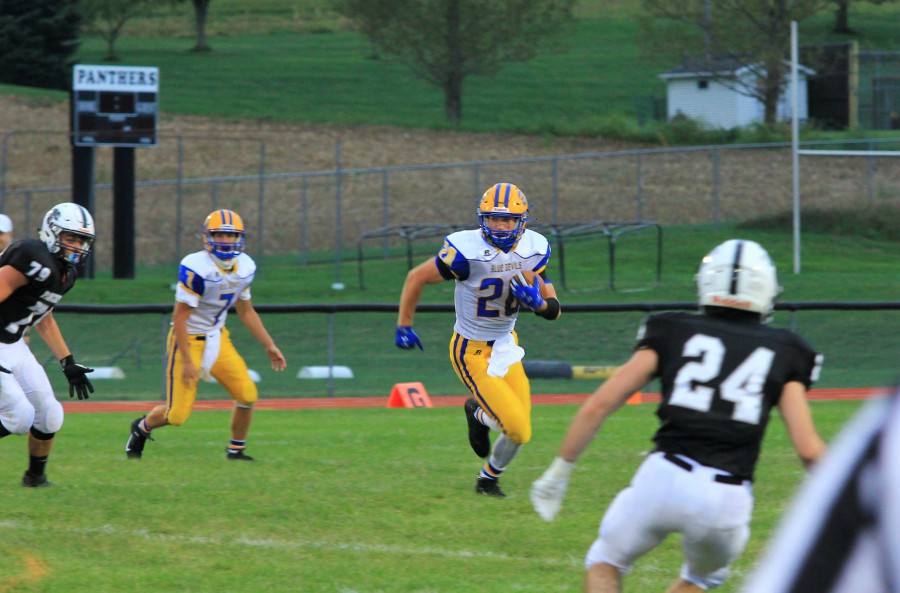 Zach Mallon bursts through a gigantic hole for some of his 151 yards on the ground against Noethern Befford.