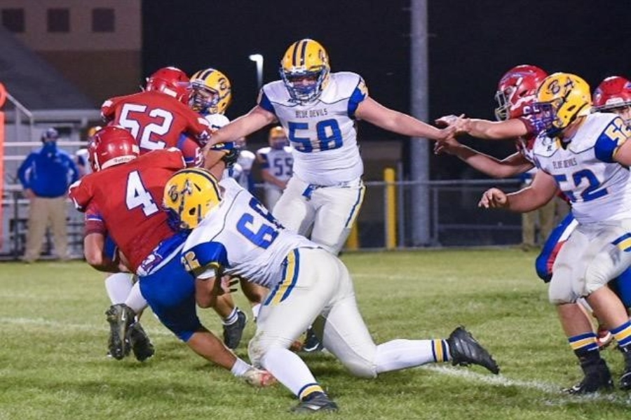Cooper Guyer gets to the quarterback for a bone-jarring sack against West Branch.