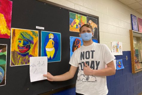 Parker Lucas poses with his artwork.