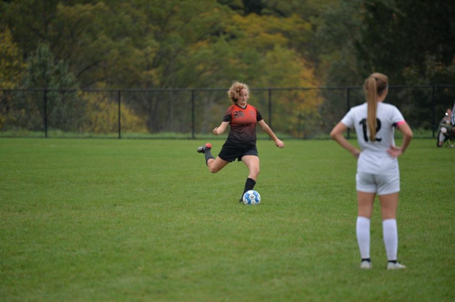 Jaylee Shuke kicks one out of trouble in Tuesdays co-op soccer game against Clearfield.