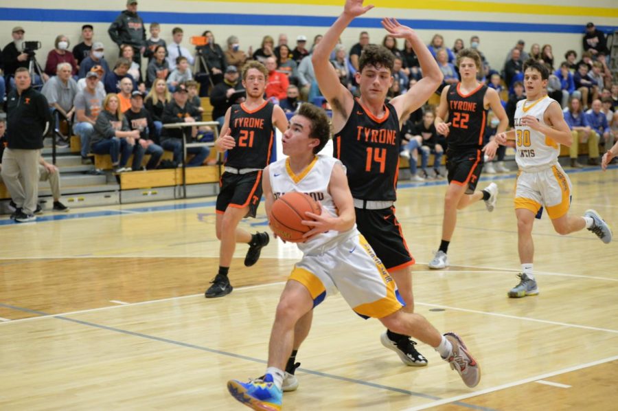 Caleb Beiswinger drives to the hoop in the first half against Tyrone.