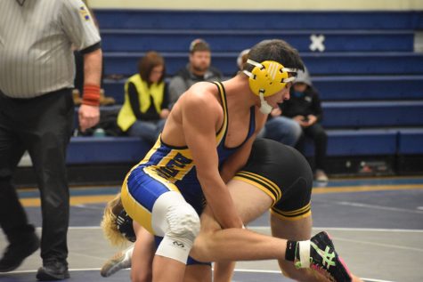 Julius Diossa has become a team leader for the Blue Devil wrestlers.