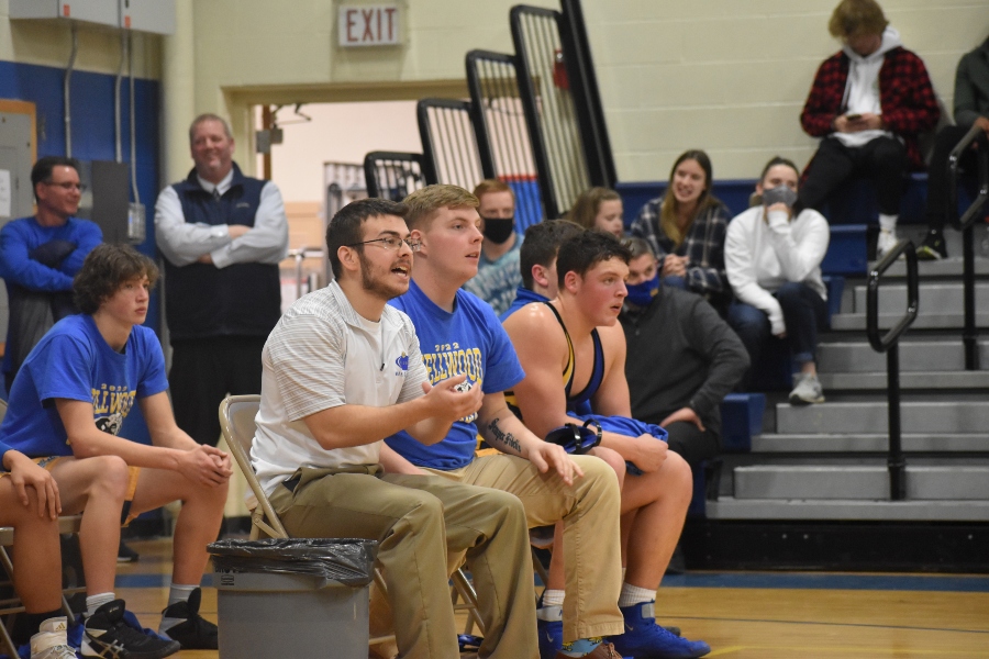 Kyle Fink stepped down as varsity wrestling coach Tuesday.