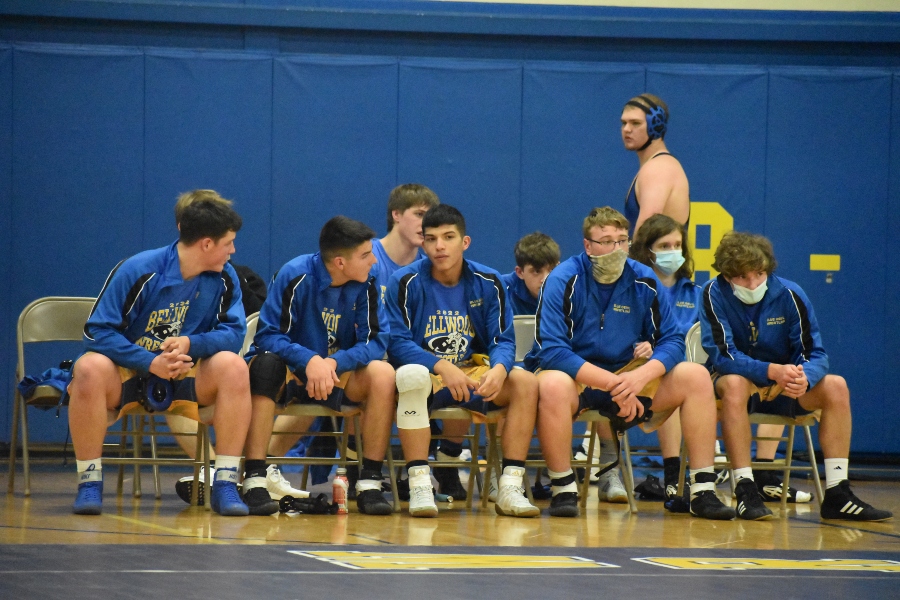 Senior wrestlers like Julius Diossa (center) are trying to make the best of losing the teams Senior Night match.
