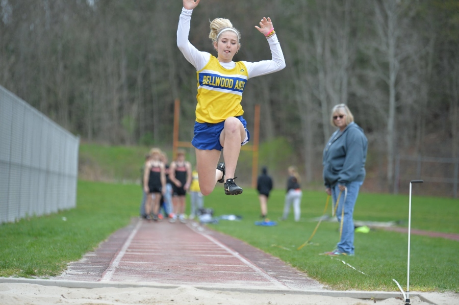 Chloe Hammond competes in the triple jump against Tyrone. Both the boys and girls track and field teams posted wins against their rivals.