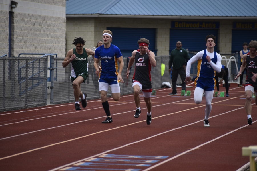 Cooper+Keen+and+Sean+Mallon+jockey+for+position+in+the+100-meter+dash.