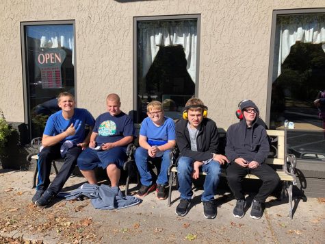 Parker Lucas, Noah Larson, Vincent Daughenbaugh, Jacob Miller, Frankie Pulcinello pose outside of Irvin's on Main.