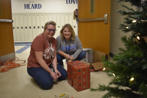 Mrs. Riddle and Mrs. Frank take time for a photo during the 2022 Day of Giving. (BluePrint file photo)