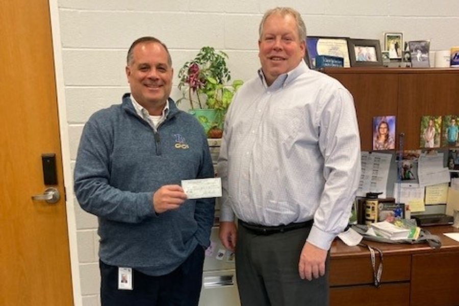 Kiwanis president Fred Miller, right, dropped by Bellwood-Antis earlier this month to present a check to Superintendent Edward DiSabato targeted at reading initiatives at Myers Elementary.