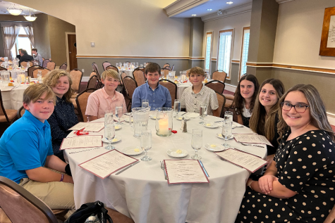 Eight middle school students attended a leadership luncheon in late October.