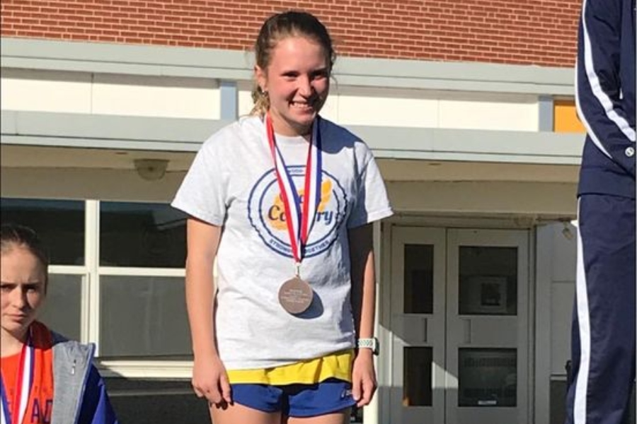 Alexis+Lovrich+punched+her+ticket+to+the+PIAA+cross+country+championship+meet+with+a+top-5+finish+at+Districts+last+weekend.