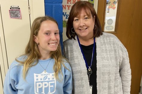 Mrs. Nycum poses with one of her past students, Lexi Lovrich.