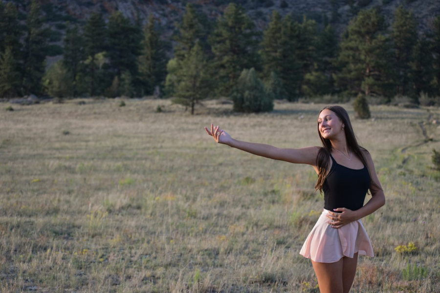 Maliah dancing in the Colorado Mountains.