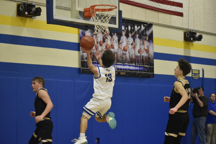 Caleb Beiswenger take it to the rim against Curwensville. Beiswenger finished with double-digits, but B-A lost a close one.