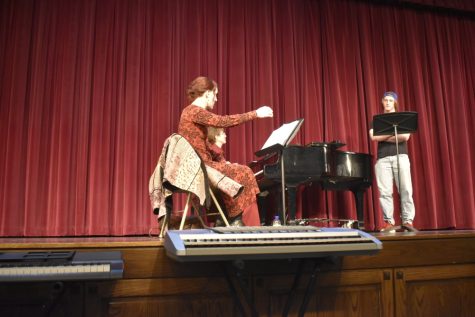 B-A senior Jason Pluebell receives instruction from Bonnie Bridget Cutsforth-Huber during a masterclass held at the school.