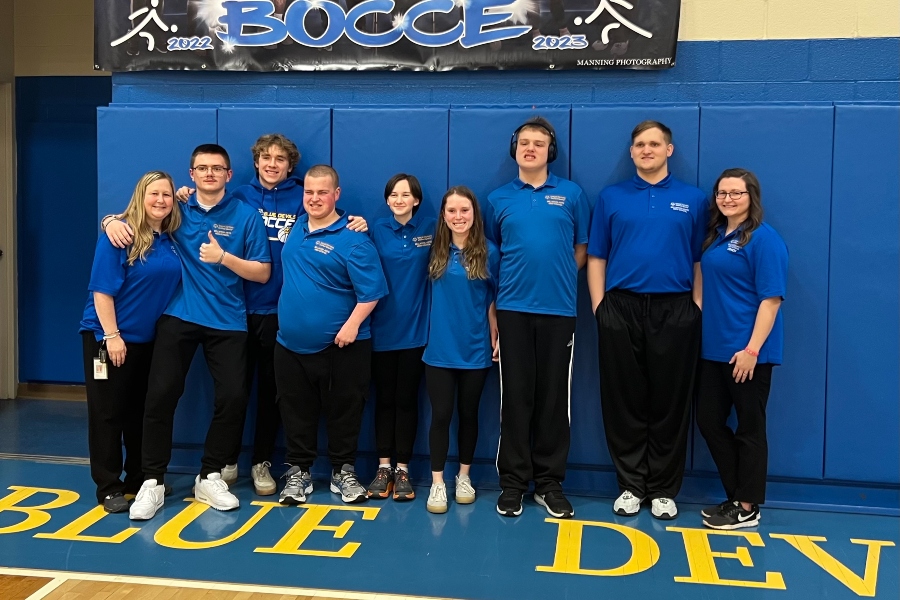 The bocce team gets a picture after senior night.