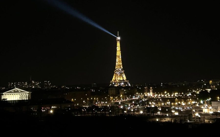 The Eifel Tower beams brightly over Paris. (Payton Martin)