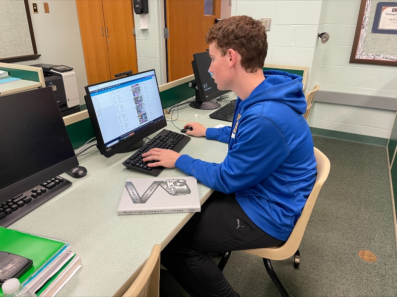 Yearbook Editor Vincent Cacciotti working on the finishing touches of the yearbook.