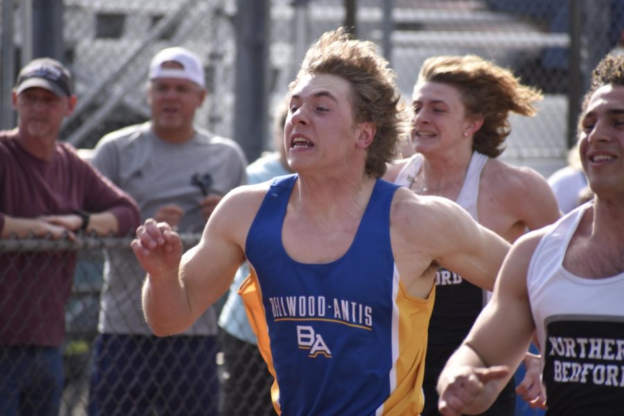 Gaven Ridgway runs as fast he can in the 100. (Bailee Conway)