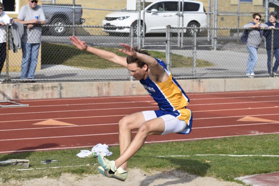 Dylan Andrews triple jumping.  (Bailee Conway)