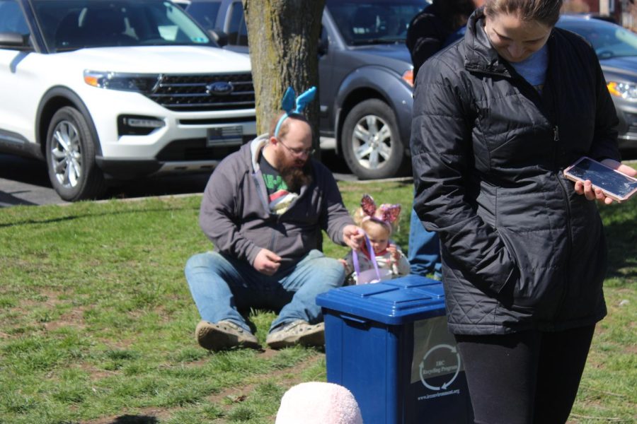 Two Easter bunnies counting their candy.