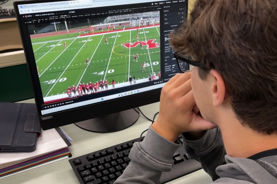 Senior Jordan Hescox watches film to prepare for an unusual offense this week against Westmont Hilltop.