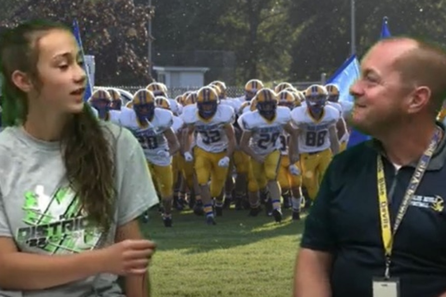 Coach+Lovrich+talks+to+Chloe+about+tonights+game+at+Huntingdon.