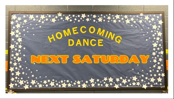 A bulletin board in the Media Center advertises for the dance.
