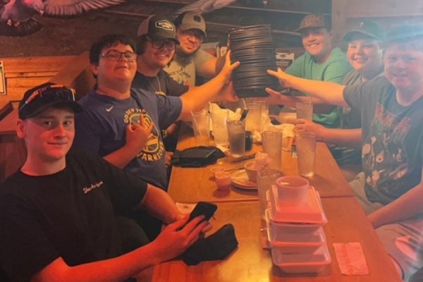 Two different groups of food challenge legends from Bellwood-Antis set records for eating rolls at Texas Roadhouse.