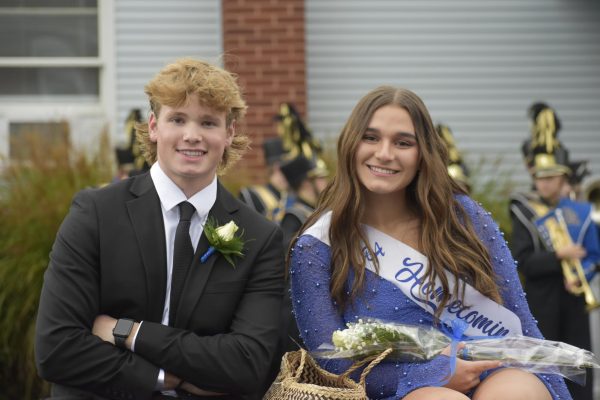 Miranda Tornatore poses at the Homecoming parade with her escort Connor Cobaugh.