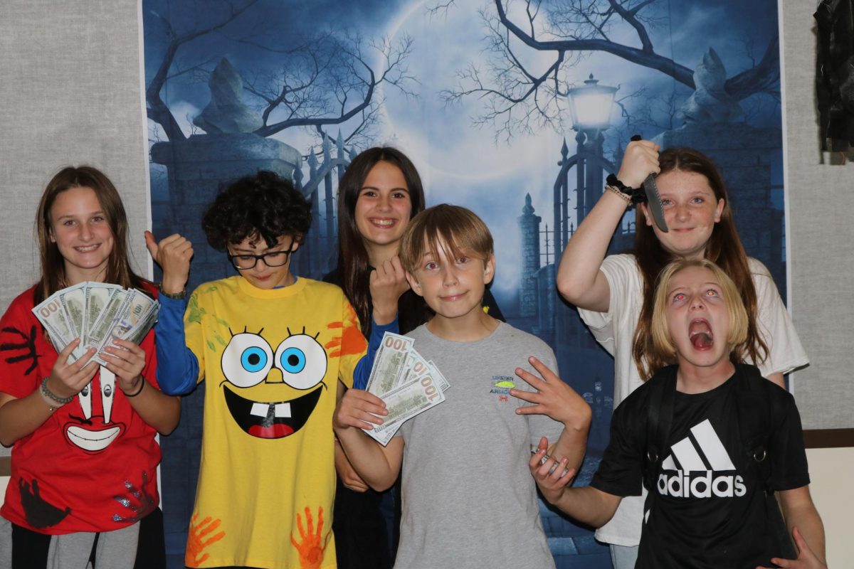 Students participating in Safe Trick or Treat Night had a chance to have their pictures taken at the freshman class photo booth. (Eric Johnson)