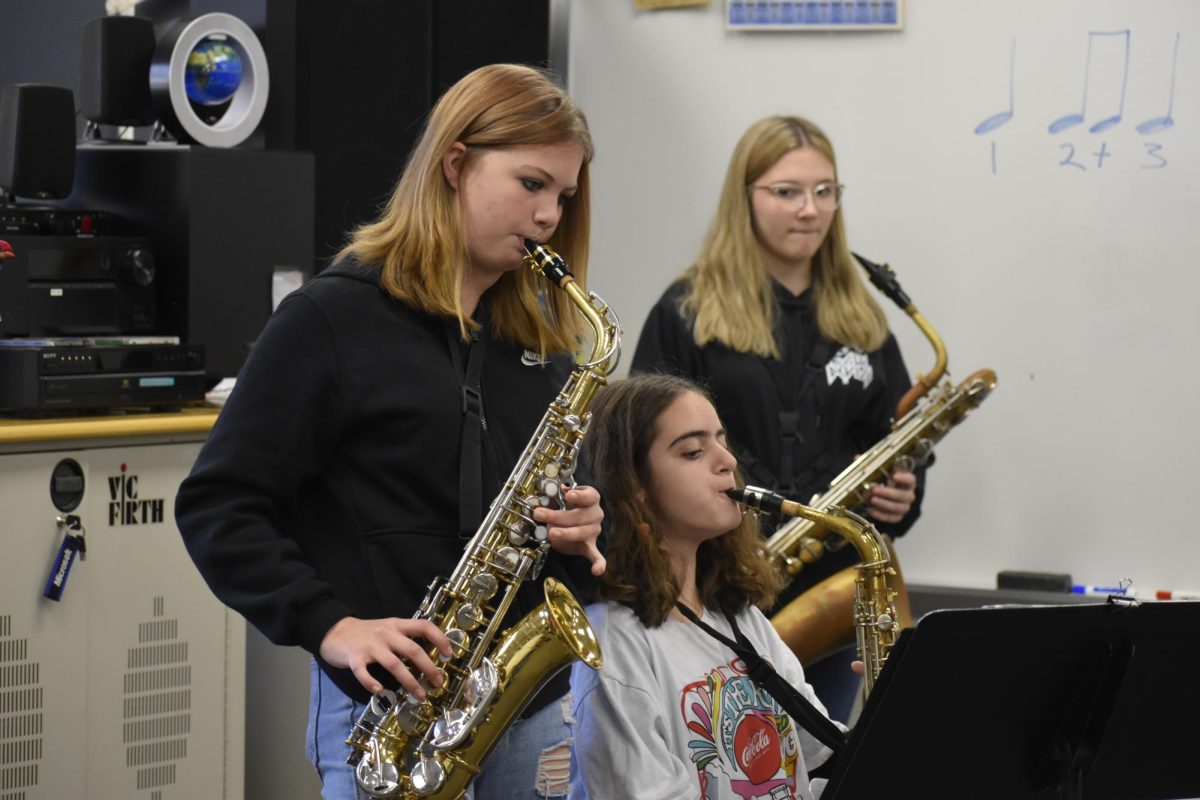 Band members show off their playing skills at the Myers. (Morgan Kienzle)