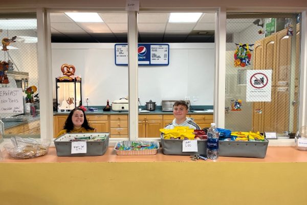 Kimmy Bennett and Jacob Caracciolo were among the first NHS members to volunteer at the Northern Blair COunty Rec Center last weekend.