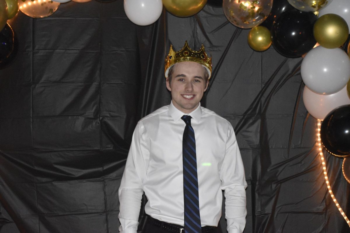 Senior Thad Dick smiles after being crowned Mr. Mini-Thon.