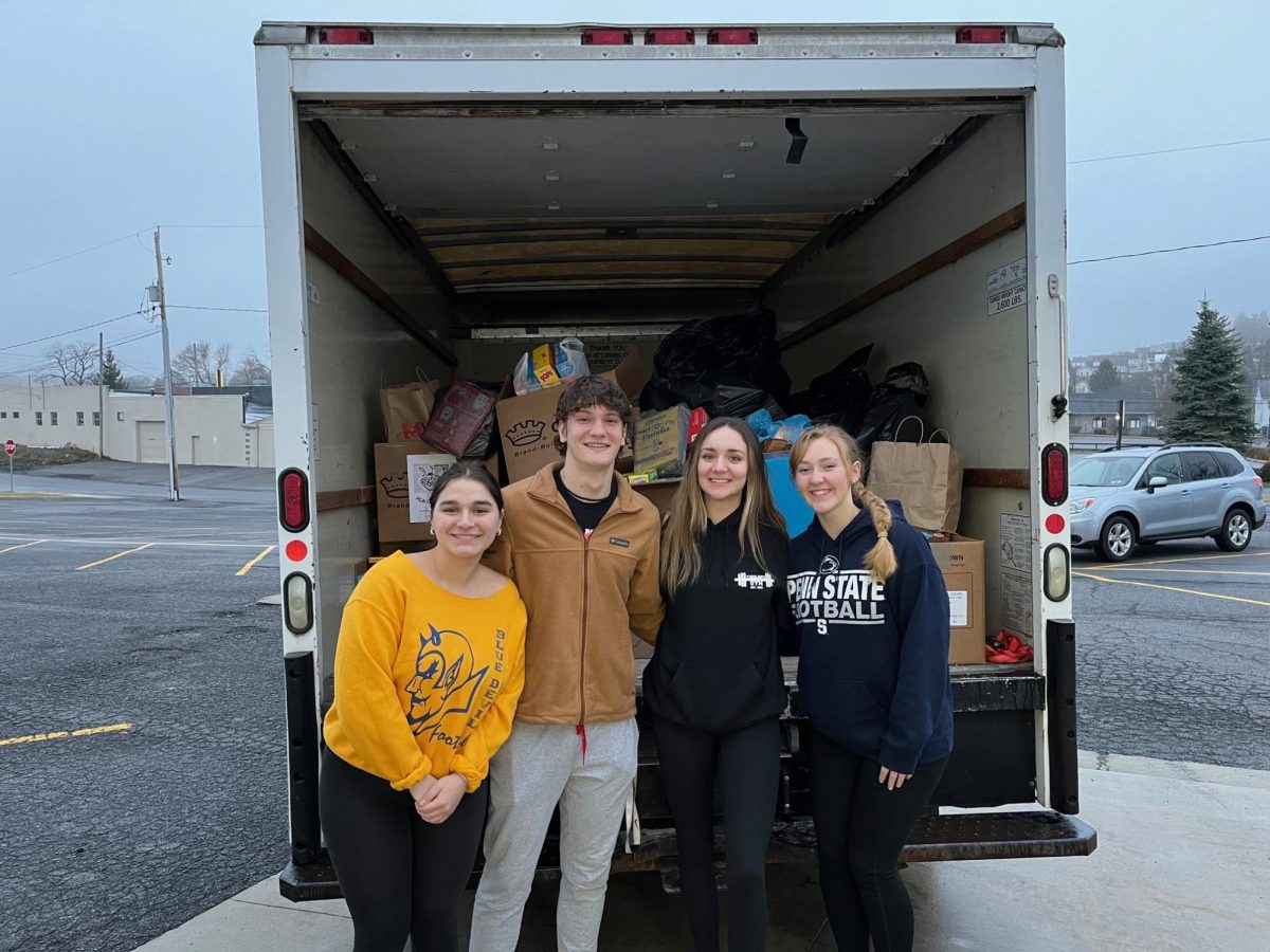 FCA+officers+travelled+to+the+St.+Vincent+DePaul+Food+Pantry+to+drop+of+933+boxes+of+cereal+donated+through+their+annual+cereal+drive.+Members+present+included%3A+%28l+to+r%29+Miranda+Tornatore%2C+Corry+Shanafelt%2C+Ava+Kensinger%2C+and+Olivia+Hess.