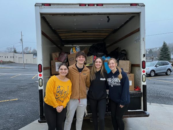 FCA officers travelled to the St. Vincent DePaul Food Pantry to drop of 933 boxes of cereal donated through their annual cereal drive. Members present included: (l to r) Miranda Tornatore, Corry Shanafelt, Ava Kensinger, and Olivia Hess.