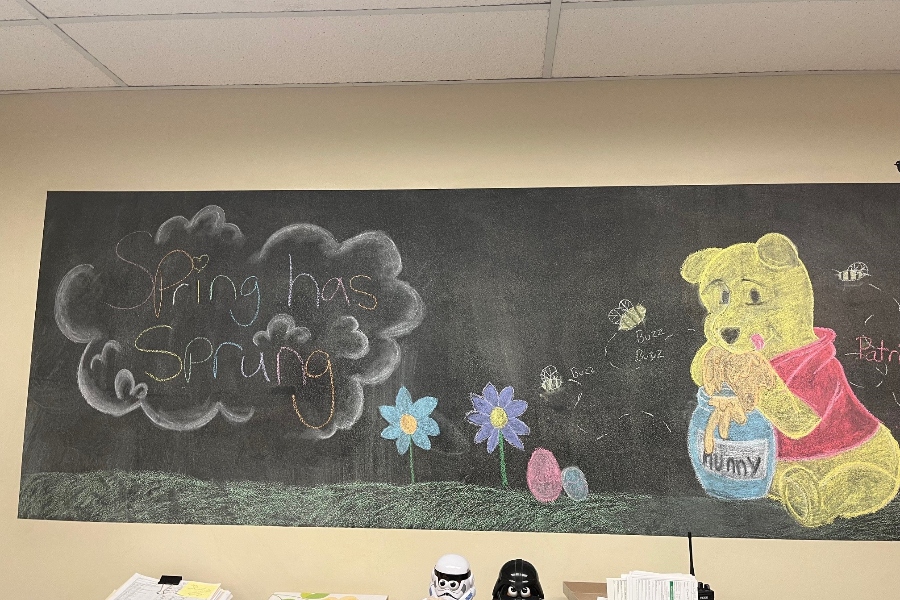 A drawing of Winnie the Poo by Patricia Henderson and Abigail McGuire is currently on display in the office of Nurse Hoover.