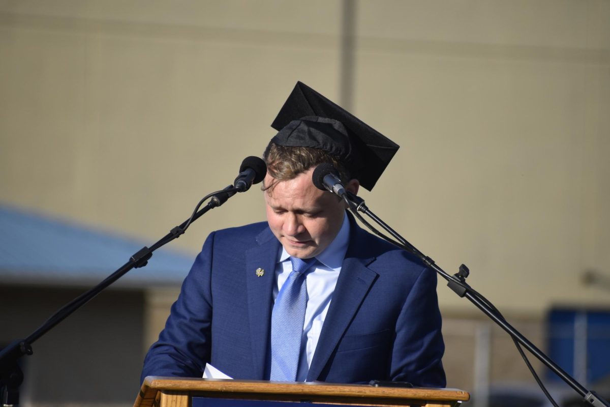 2009 grad Josh Rimmey addresses the Class of 2024 at commencement on May 30.
