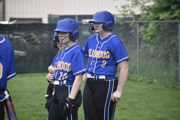 Cami Focht and Lainey Quick wait to practice their swings. (5/7/24)