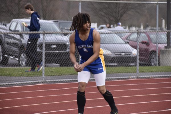 Gabe Thompson waits for the handoff in the 400 relay at a meet in April. 