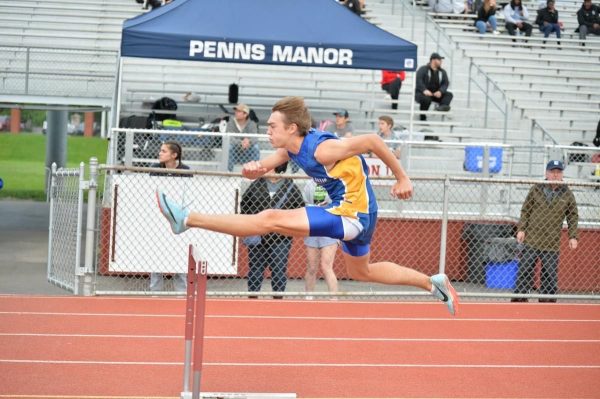 Kole Dickinson hurdling beautifully. Dickinson took third in both hurdling events at the District 6 championships to qualify for the state championship meet.