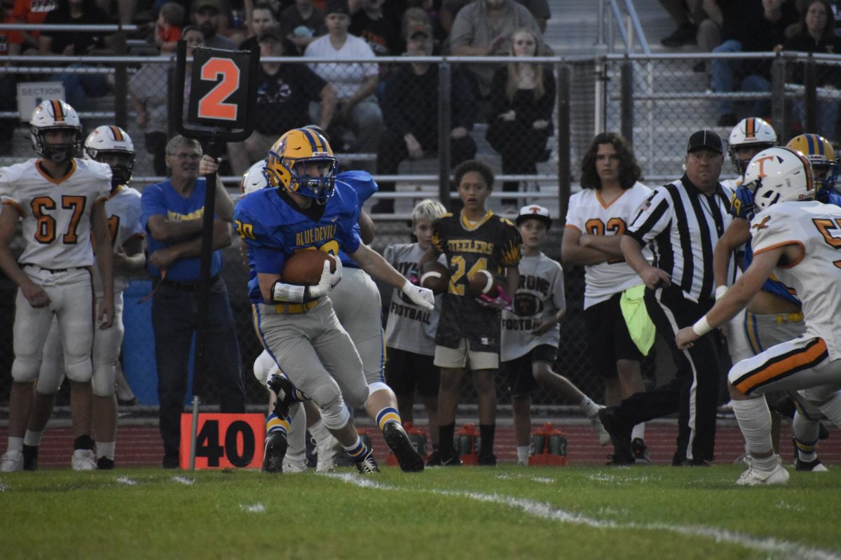 Collin runs an interception back after picking off Ashton Walk in the Backyard Brawl.