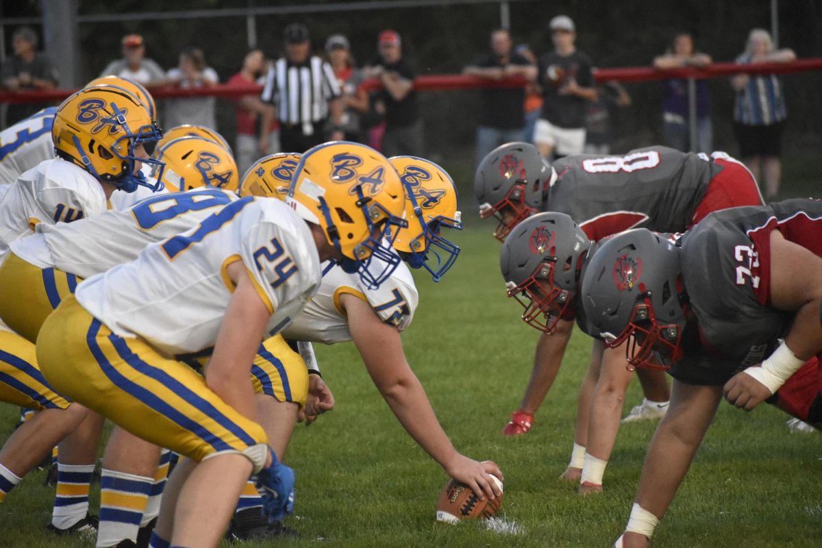 The offensive line down and ready to make a play against Central Dragons